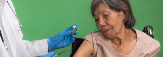 A woman having a vaccine